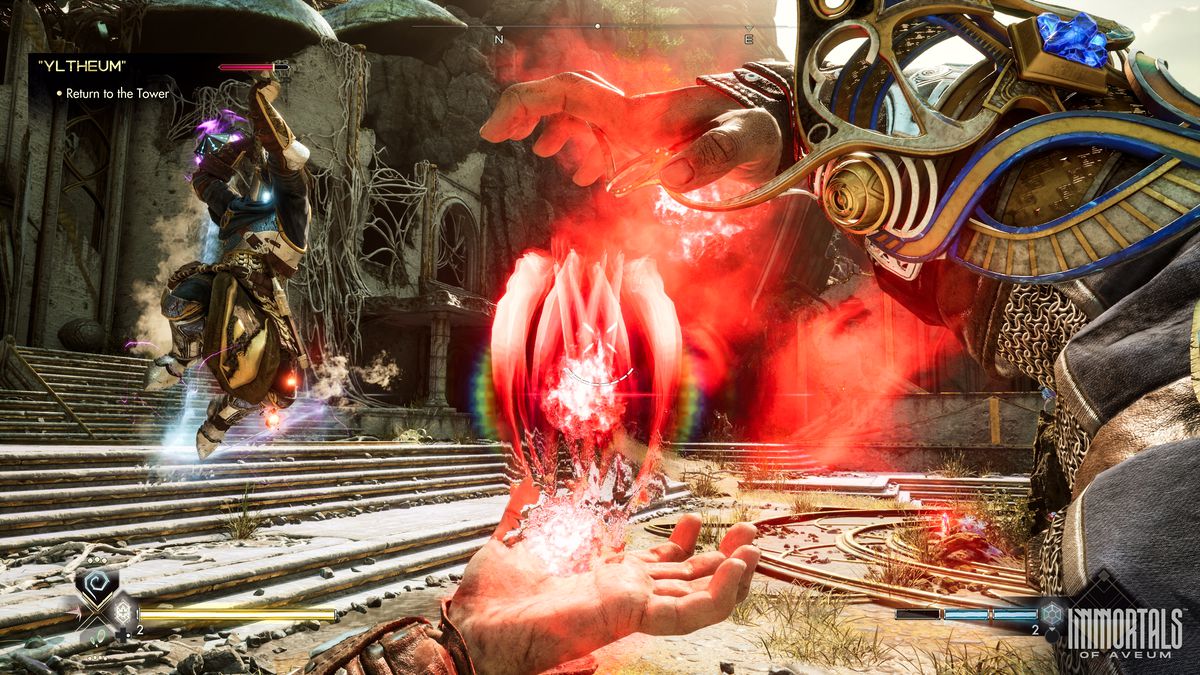 En Immortals of Aveum-skärmdump visar spelaren i första person som genererar röd magi mellan sina händer