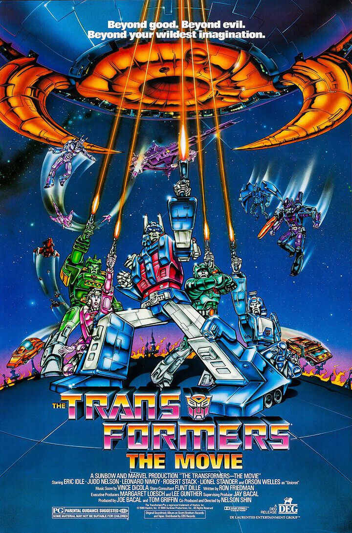 En affisch från 1986 för den animerade filmen Transformers: The Movie, med fem robotkrigare som avfyrar lasrar uppåt mot den gapande munnen på en förtärande metallplanet, och olika andra robotar och fordon som sveper runt i bakgrunden