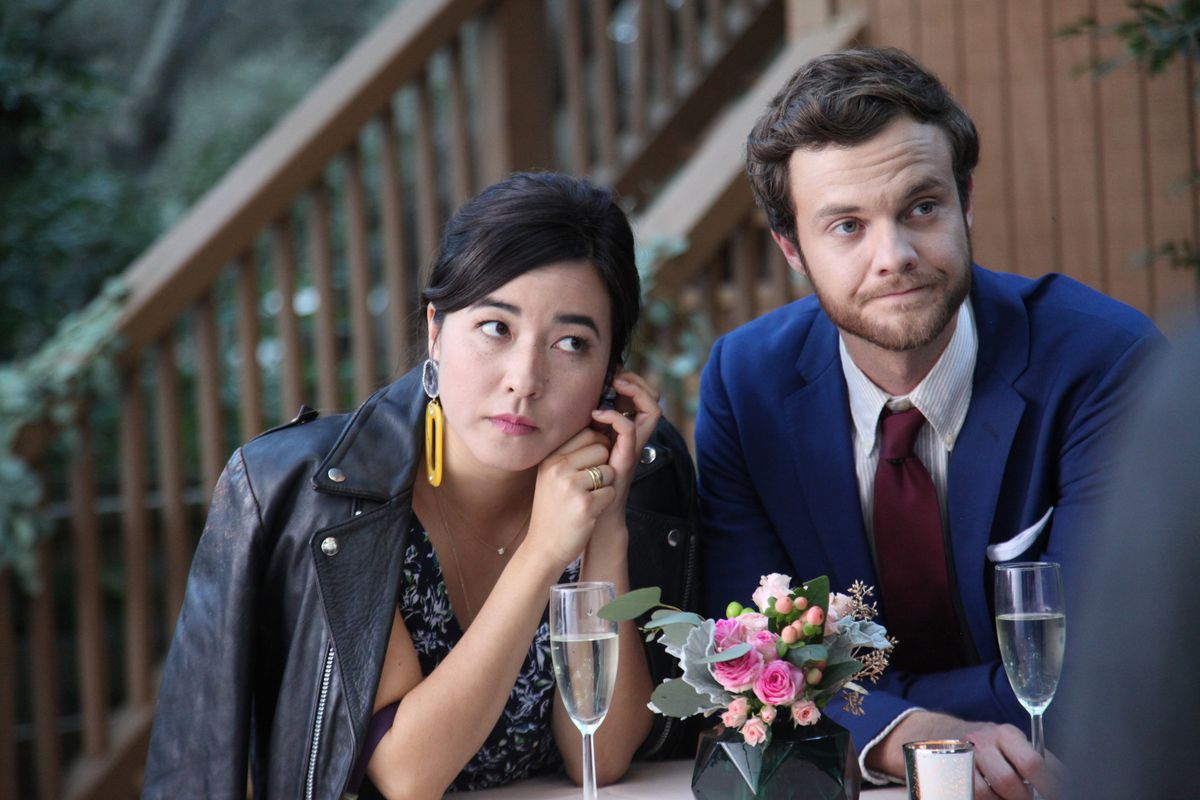 Maya Erskine (Pen15) and Jack Quaid (The Boys) looking nice for a wedding in Plus One