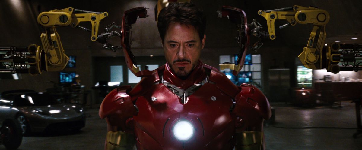 tony stark suits up in the mark III armor in iron man (2008)