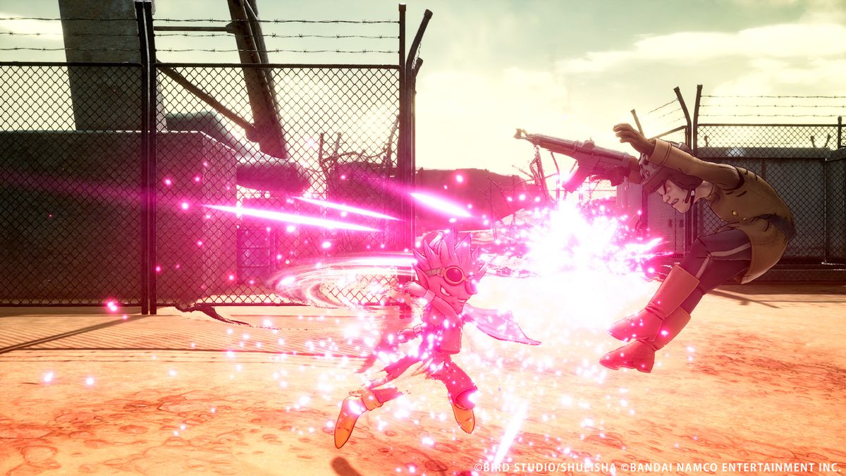 Beelzebub slår en soldat i en militäranläggning med rosa energi som sprängs av stöten i Sand Land