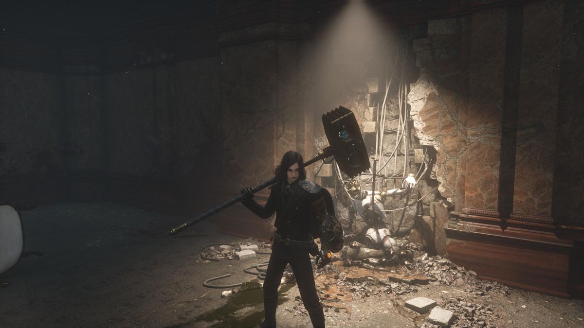 The player wields a giant sledgehammer, with a chained puppet behind them.
