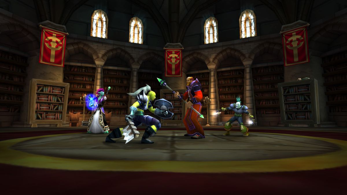 Ett team hjältar slåss mot en mageboss i Scarlet Monastery-fängelsehålan i World of Warcraft Classic