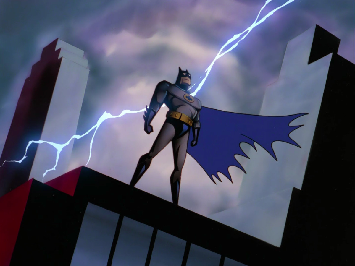 Still of Batman standing on a building with a streak of lightning in the background from the theme sequence of Batman: The Animated Series.