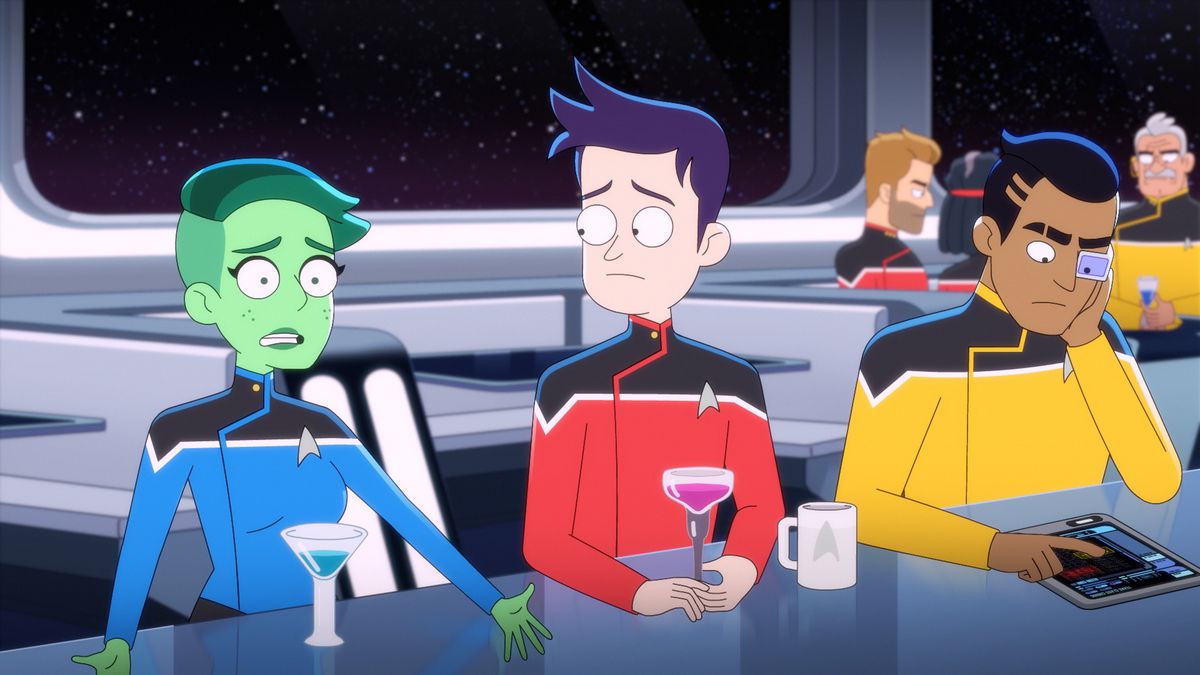 Ensing Tendi, Ensign Brad, and Ensign Rutherford sit and share drinks together in Lower Decks.