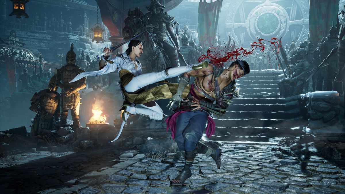 Ashrah sparkar Havik i ansiktet i en skärmdump från Mortal Kombat 1