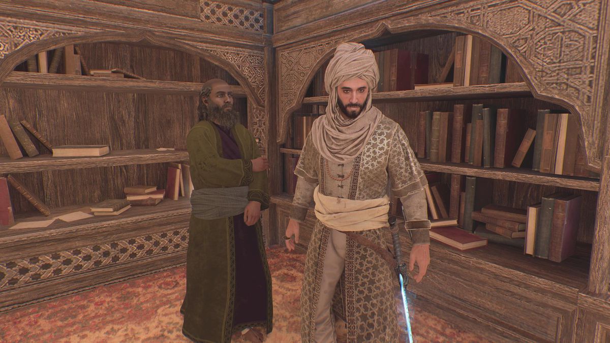Basim bär Scholar Costume i ett bibliotek i AC Mirage.