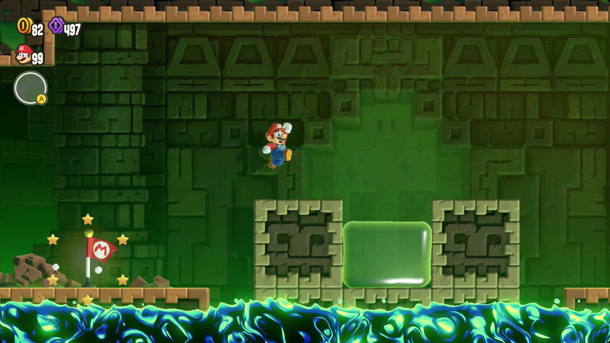 Super Mario Bros. Wonder A Final Uncharted Area: Poison Ruins skärmdump som visar Wonder Flower-platsen.