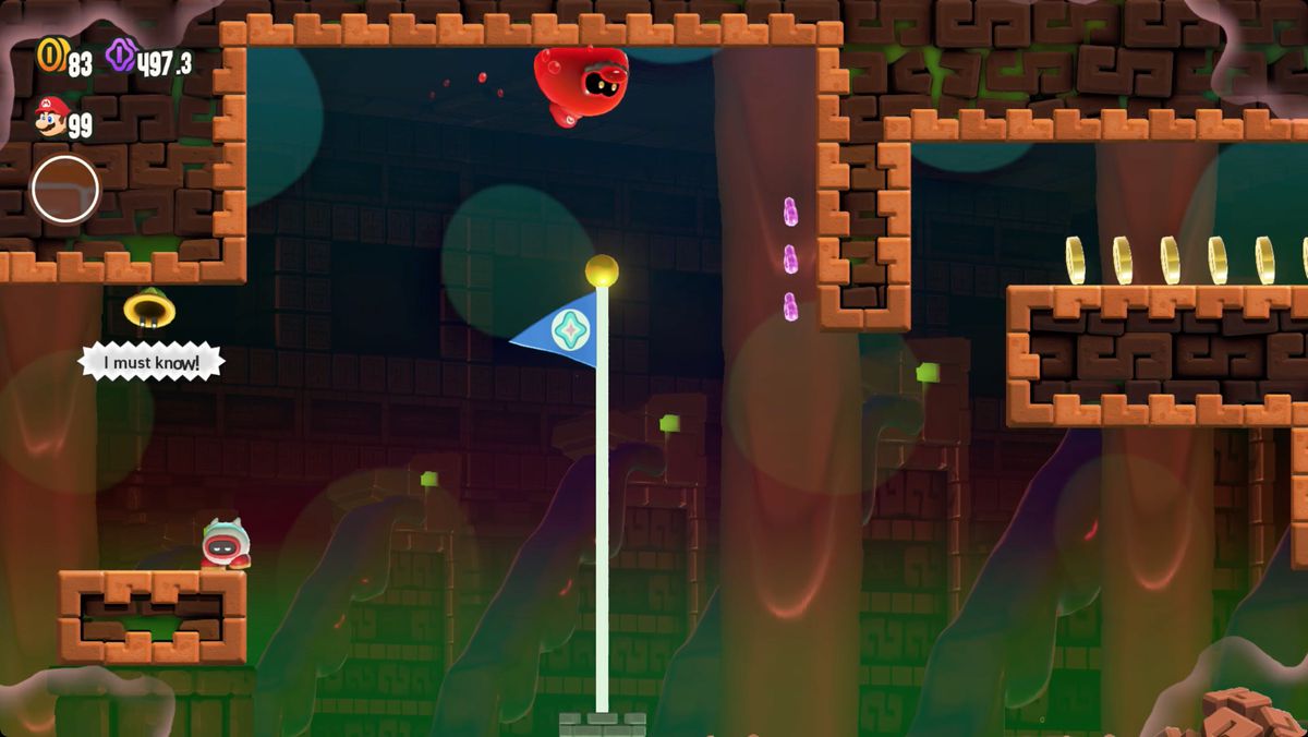 Super Mario Bros. Wonder A Final Uncharted Area: Poison Ruins skärmdump som visar vägen till ett Wonder Seed.