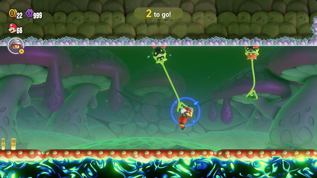 Super Mario Bros. Wonder Taily's Toxic Pond skärmdump som visar Wonder Flower-platsen.
