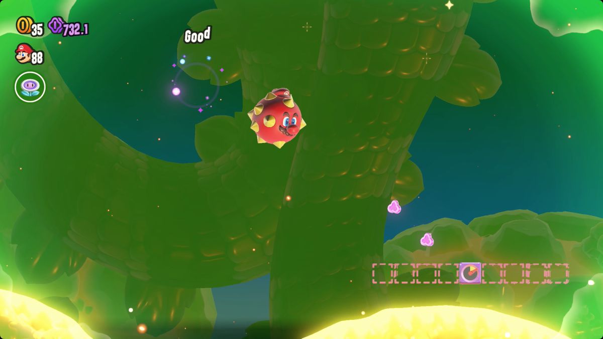Super Mario Bros. Wonder Deep Magma Bog Special Solar Roller-skärmdump som visar vägen till ett Wonder Seed.