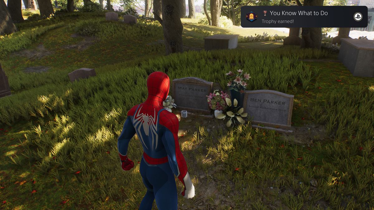 Peter besöker May och Ben Parkers gravar i Spider-Man 2