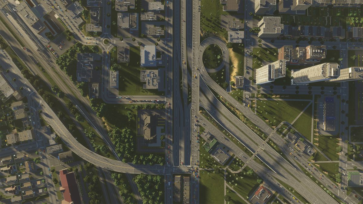 En bild i fågelperspektiv av sammankopplade motorvägar och gator i Cities: Skylines 2