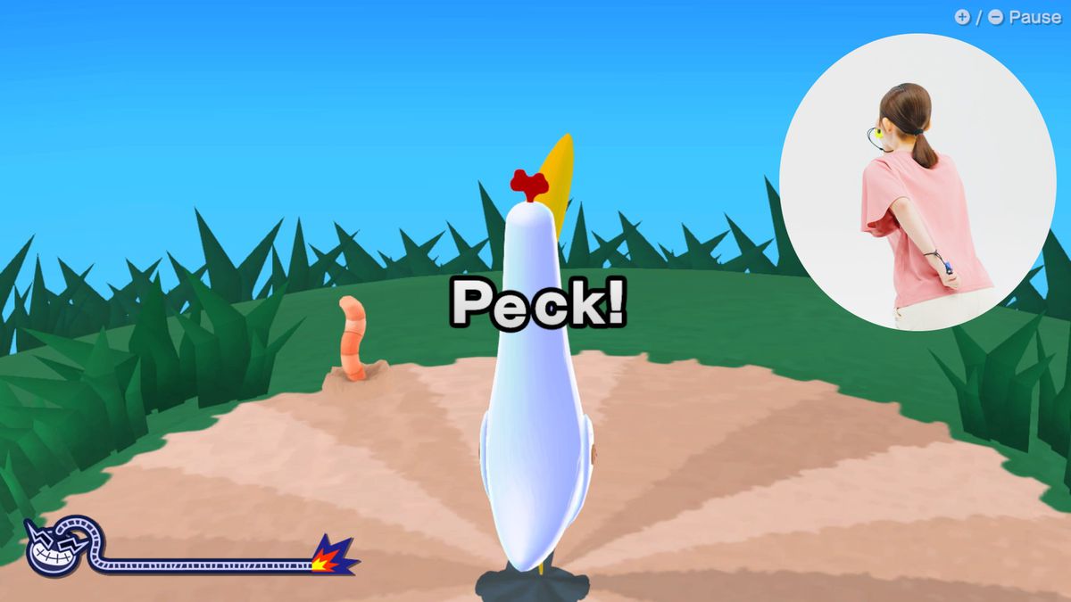 En skärmdump av WarioWare: Move It!  med en fågel i mitten av skärmen, uppmaningen 