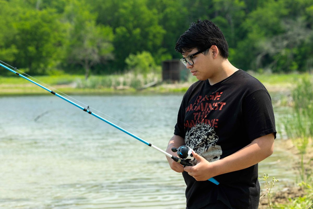 Lane Factor as Cheese fishing in a still from Reservation Dogs season 3