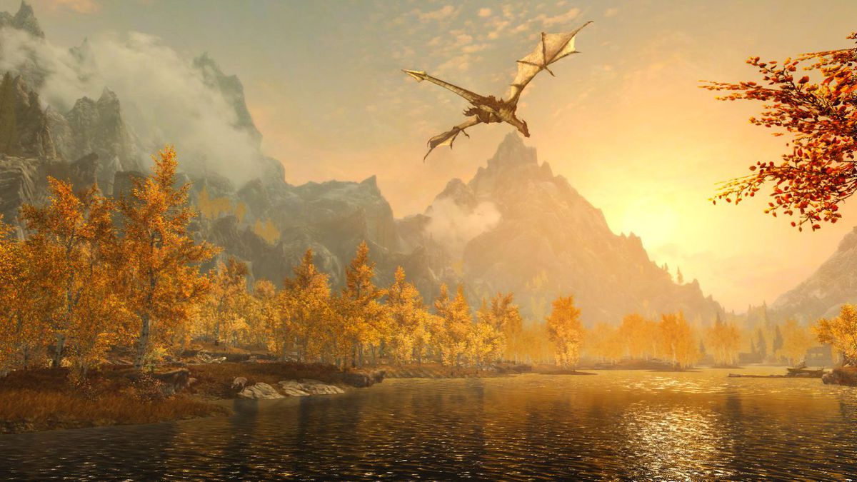 En drake flyger över en höstlig skog som delas av en glittrande flod i gryningen i The Elder Scrolls 5: Skyrim Special Edition