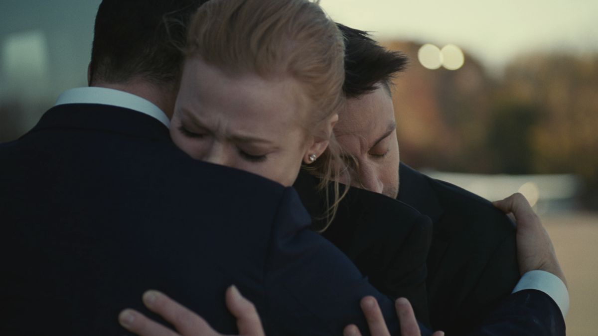 Kendall (Jeremy Strong) hugs Shiv (Sarah Snook) and Roman (Kieran Culkin)