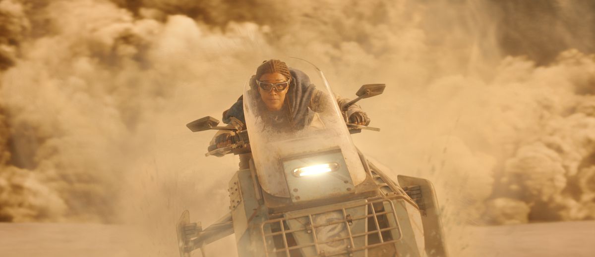 Sonequa Martin-Green rides a futuristic motorcycle through a desert in season 5 of Star Trek: Discovery