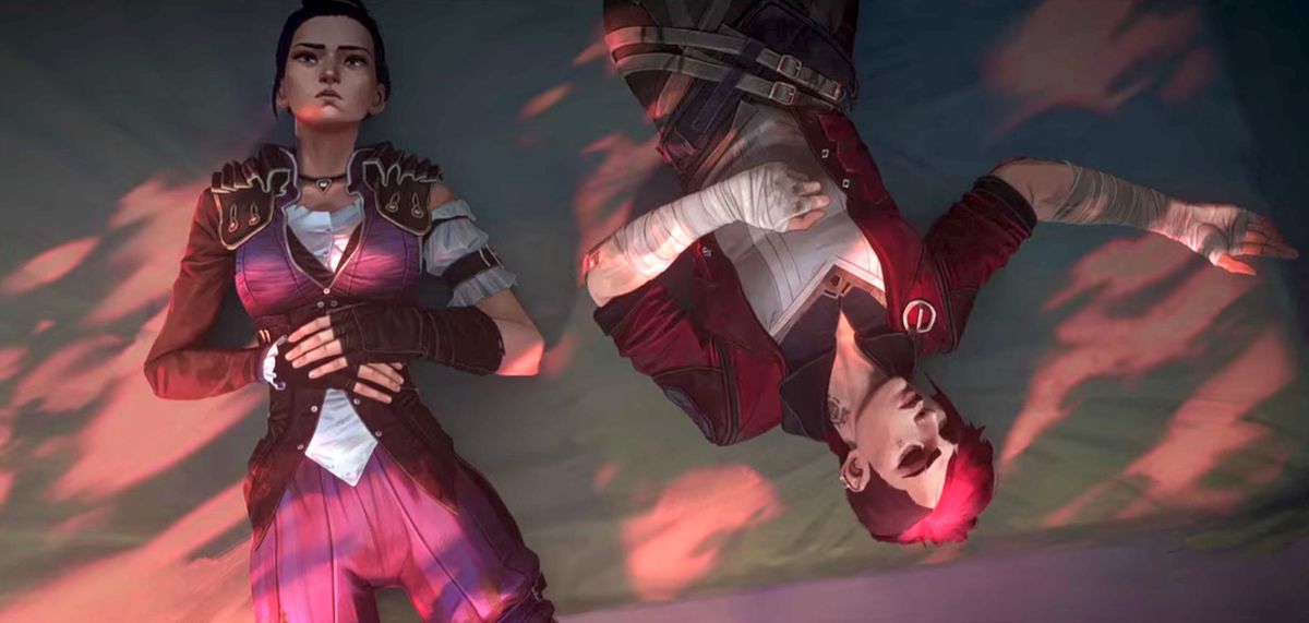 An eagle eye shot of Arcane’s Caitlyn and Vi laying on the ground next to each other