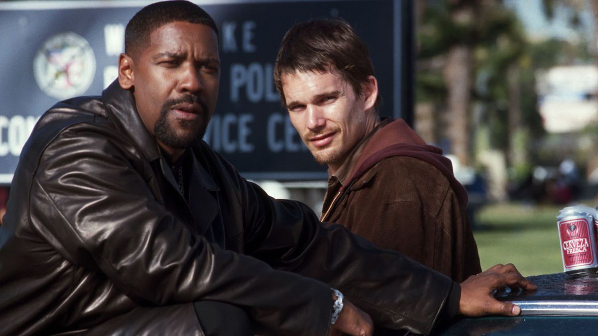 Denzel Washington and Ethan Hawke lean on a car in Training Day