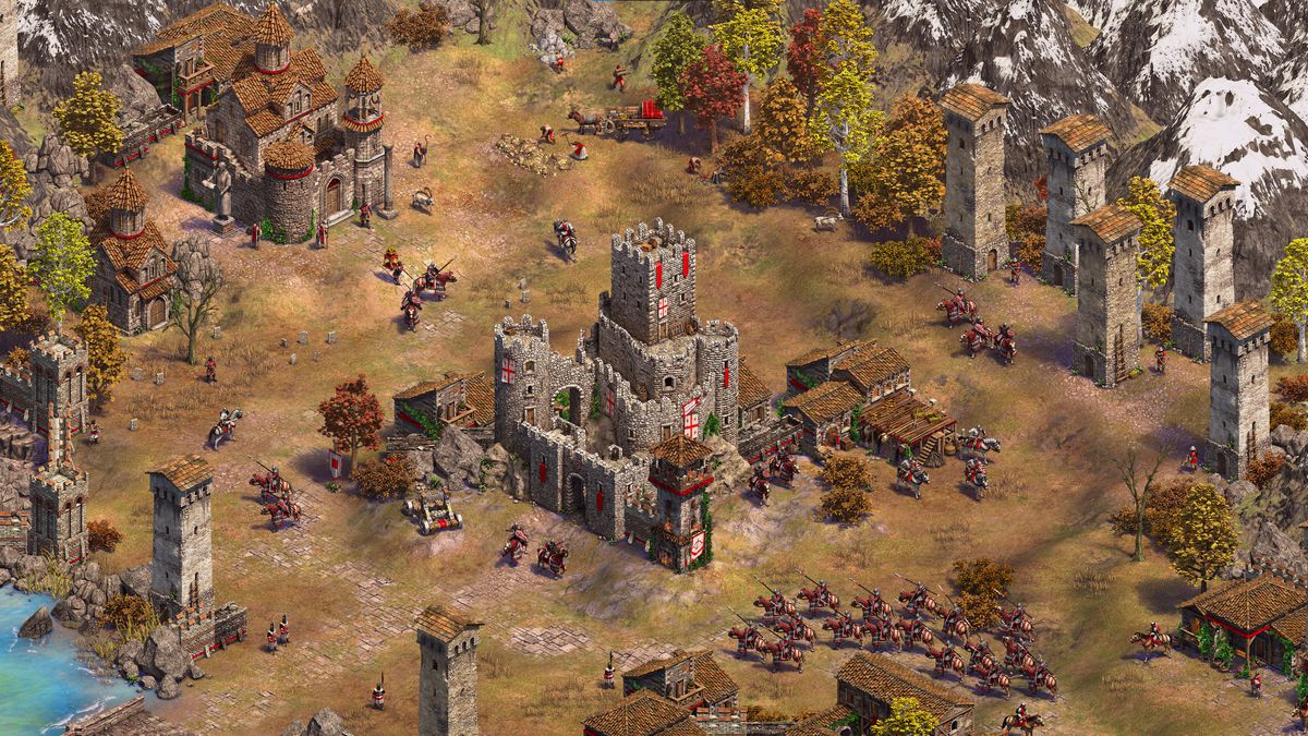 En liten armé av kavalleri närmar sig slottet i centrum av en bas i Age of Empires 2: Definitive Editions Mountain Royals expansion