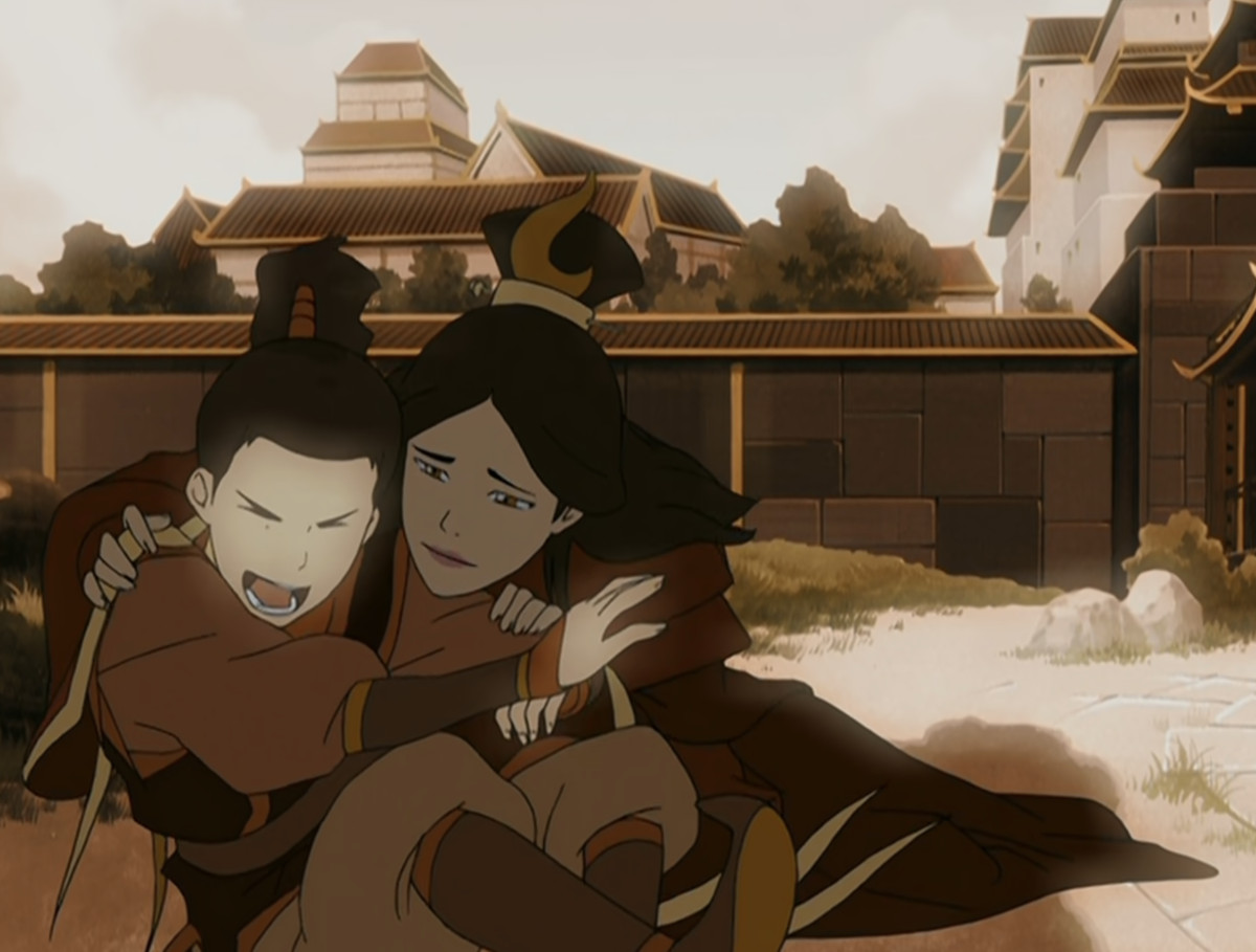 En stillbild från Avatar: The Last Airbender animerade tv-serie som visar ett minne av Zuko som barn.  Han sitter vid en damm med sin mamma och hon håller om honom medan han skrattar. 