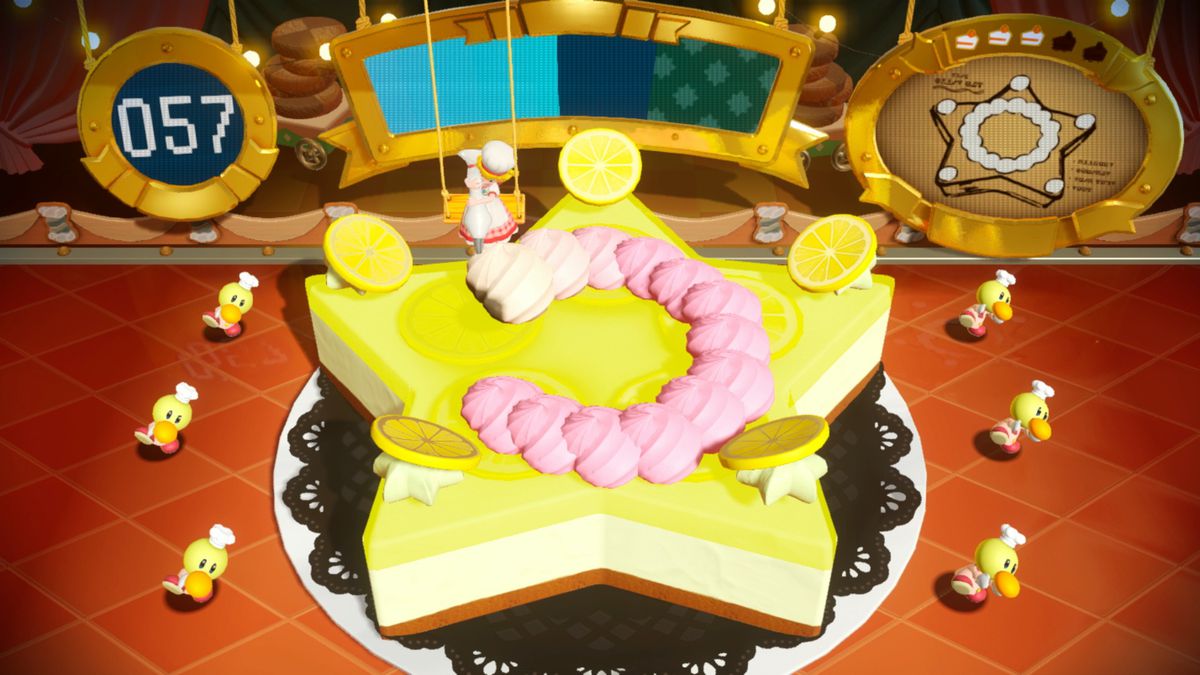 Patisserie Peach dekorerar ett gigantiskt bakverk som är omgivet av bagaren Theets i en skärmdump från Princess Peach: Showtime!