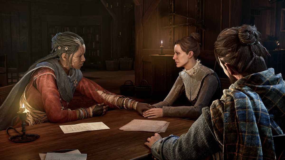 Antea och Red pratar med en kvinna runt ett bord med levande ljus i Banishers: Ghosts of New Eden.  Antea håller kvinnans hand