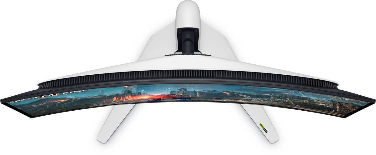 En bild uppifrån och ned av Alienware AW3225QF QD-OLED-spelmonitor.  Denna vinkel visar skärmens lätta kurva, som när den sitter framför användaren skapar en uppslukande effekt genom att uppta mer av ditt synfält.