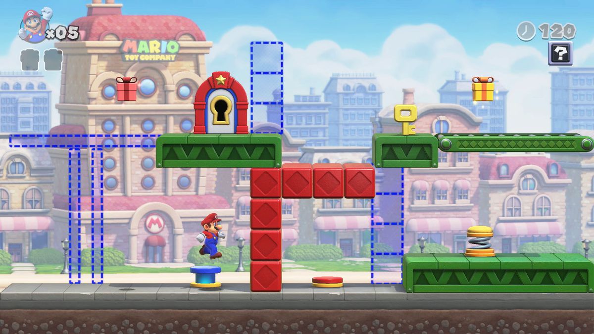Mario hoppar på en blå switch, omgiven av röda och gröna plattformar och konturer av blå