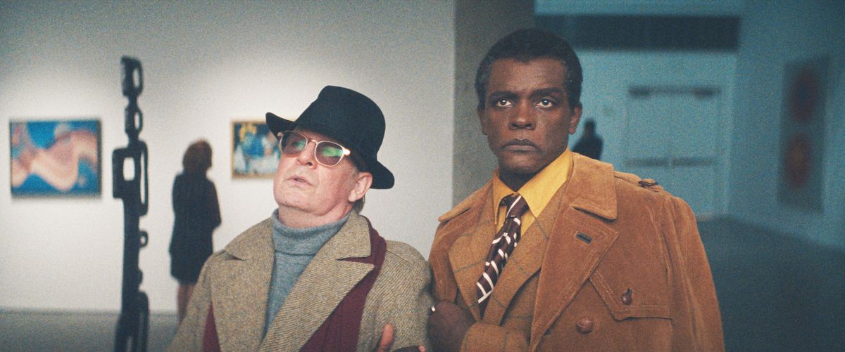 Capote (Tom Hollander) and James Baldwin (Chris Chalke) looking chic and skeptical