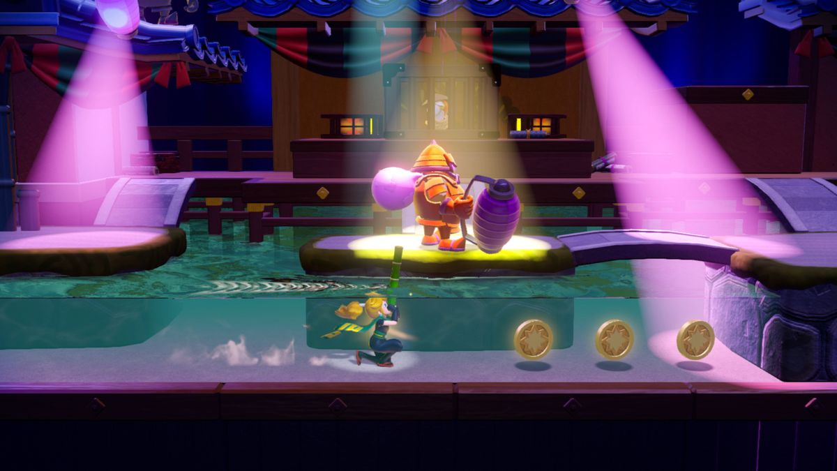 Peach, som Ninja Peach, undviker en vakt och spotlights genom att gömma sig under vattnet och använda en bambusnorkel i en skärmdump från Princess Peach: Showtime!