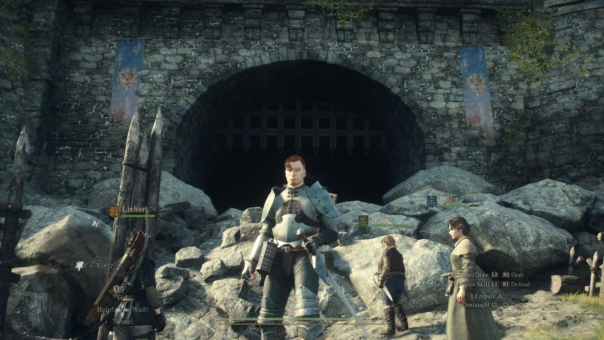 A Dragon’s Dogma 2 hero stands near the entrance to a cave that leads to the first Sphinx location for “A Game of Wits.”