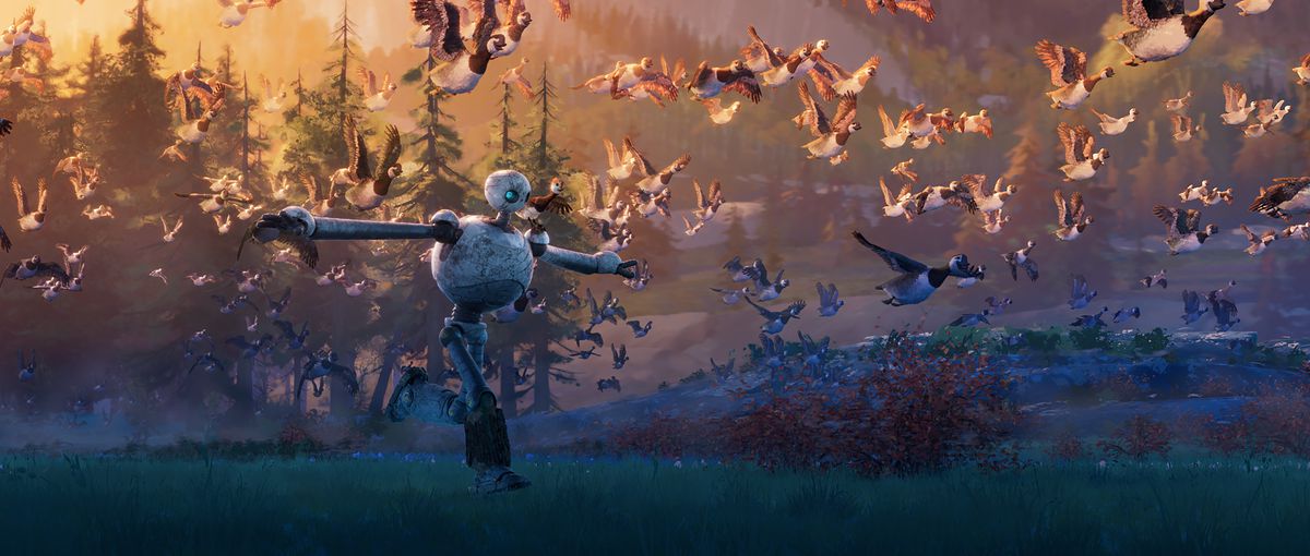 I en reklamfilm från DreamWorks animerade film The Wild Robot går en misshandlad, lökformad vit robot över ett mörkt fält med solljus som faller från ovan och håller armarna ut åt sidorna medan en flock gäss flyger bredvid henne