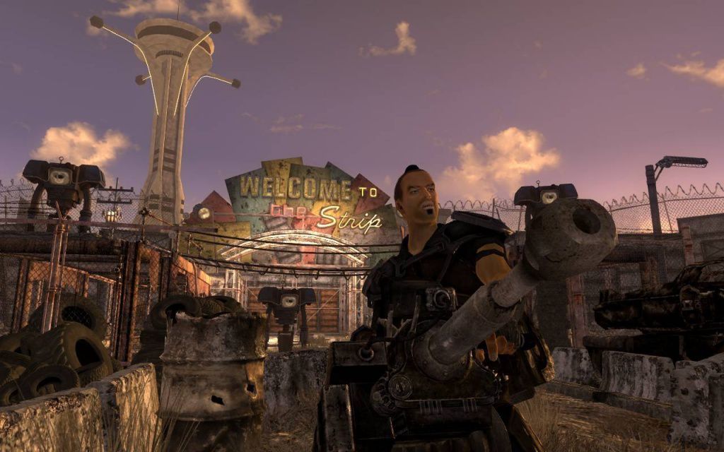 A Fallout: New Vegas skärmdump av en kille med en pistol framför en skylt som säger 