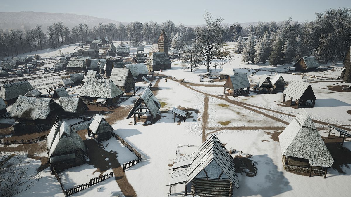 En snöig by med enkla hyddor med en kyrka i Manor Lords