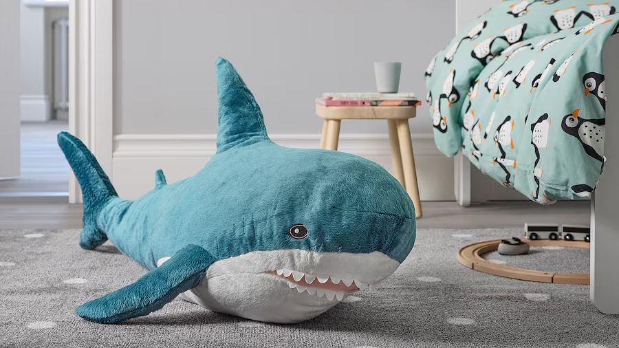 A stock photo of the BLÅHAJ shark plush from Ikea