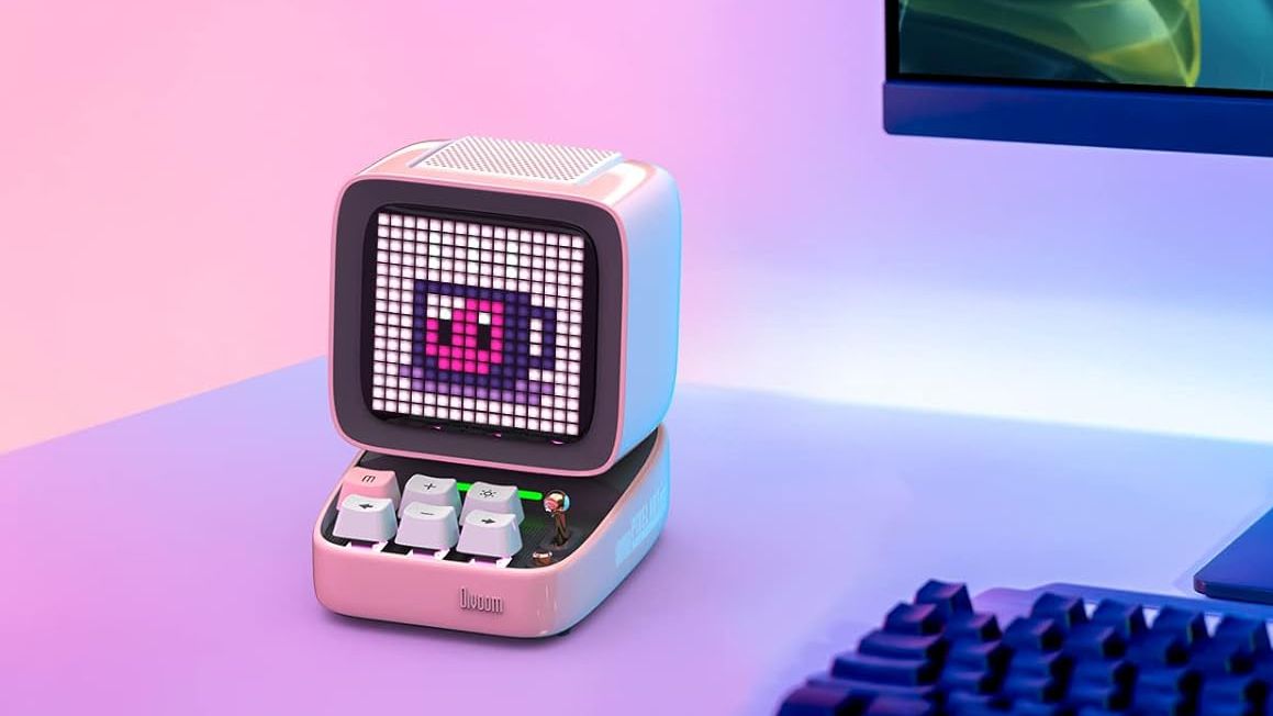 A stock photo of the pink version of the Divoom Dittoo