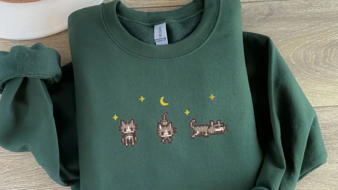 A photo of the embroidered Stardew Valley sweatshirt