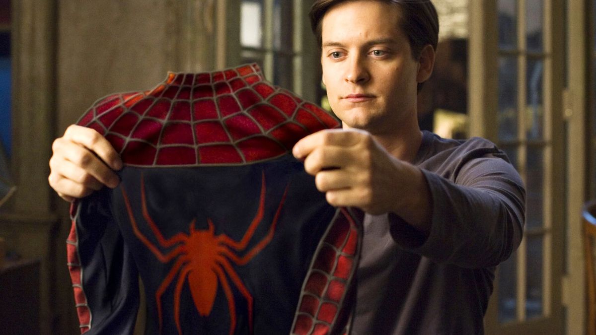 Tobey Maguire as Peter Parker contemplates his Spider-Man suit in Spider-Man 3