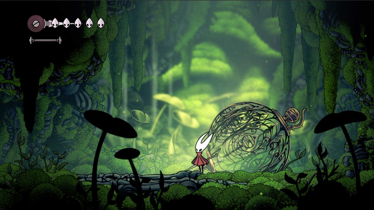 En bild av Hornet i en skärmdump för Hollow Knight: Silksong.  Hon står i en grönskande skog. 