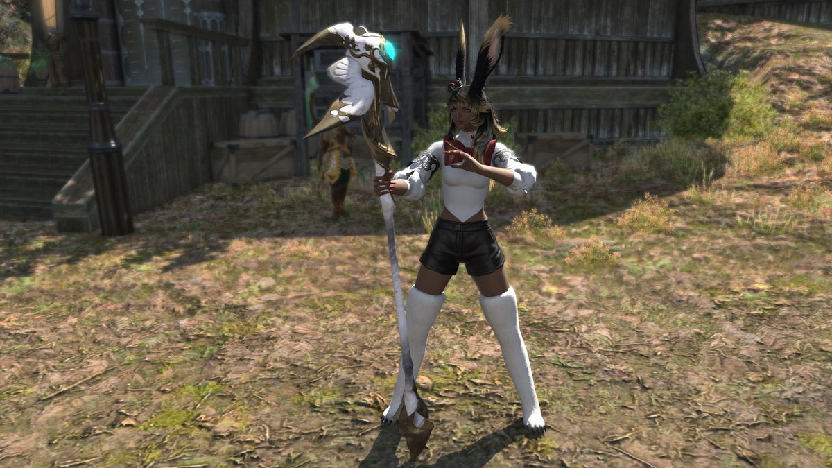 A FFXIV Viera in White Mage battle stance holding a cane with wings and a bright blue gem in the center.