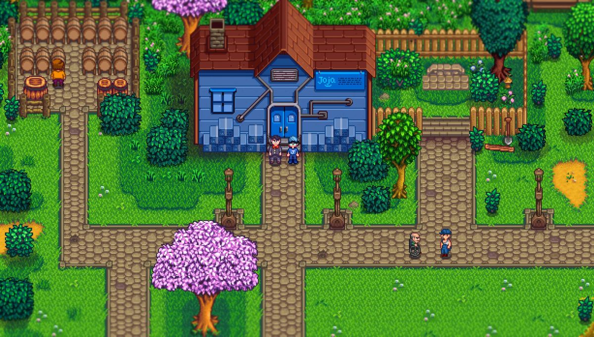 En bild av Stardew Valley Expanded-moden som visar en karaktär som står framför en Joja Mart-butik med grundspelet Stardew Valley.