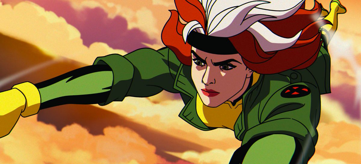 Rogue flyger genom färgglada moln, hennes hår strömmar och en bestämd blick i hennes ansikte i X-Men '97. 