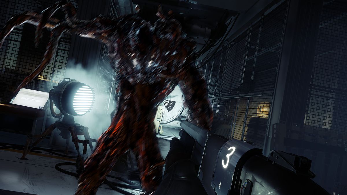 En Typhon-infekterad besättningsmedlem i Talos I hotar huvudpersonen.  Varelsen är en rymddräkt full av svart, bläckaktigt material som breder ut sig i tentakler.  Typhon står i en industrihall.
