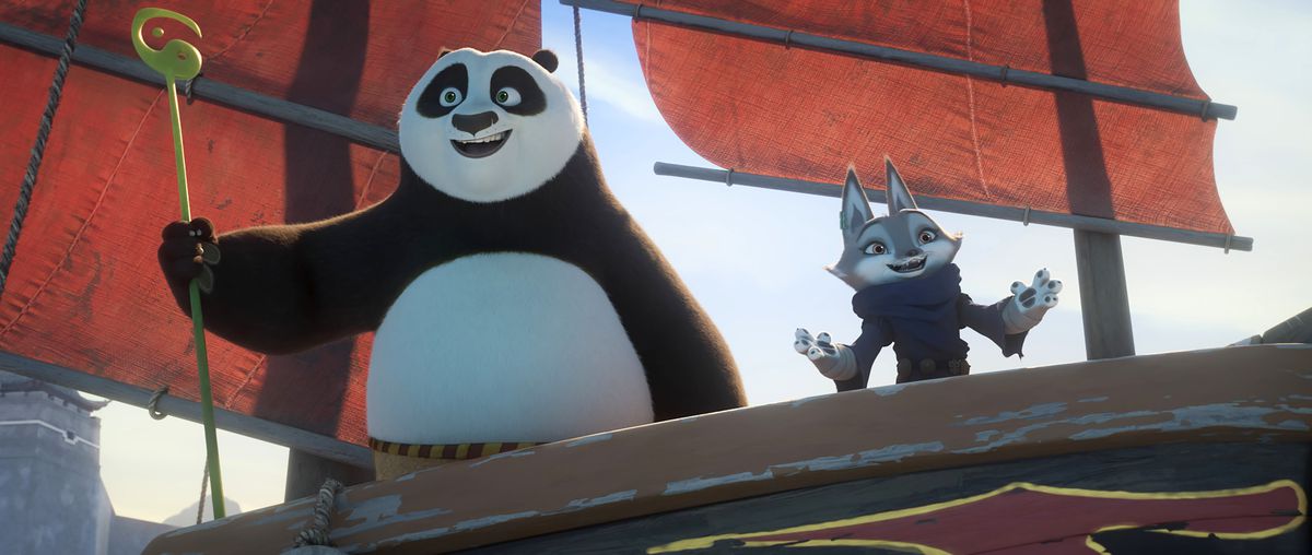 Po the panda (Jack Black) and Zhen the gray fox (Awkwafina) stand on the deck of a ship, both open-mouthed-smiling, in Kung Fu Panda 4