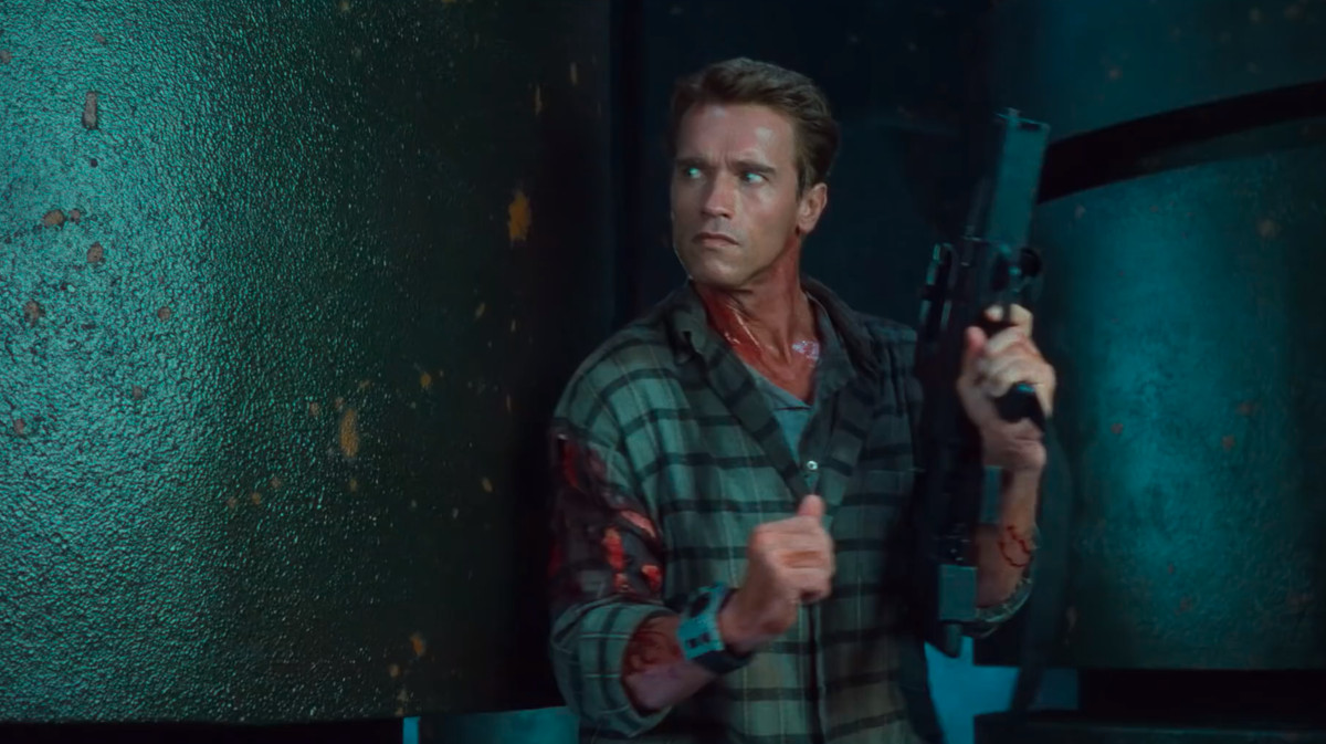 Schwarzenegger holds a gun in Total Recall