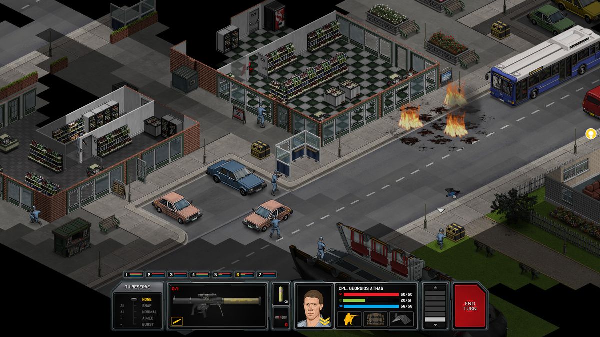 In an image from Xenonauts, a squad gets into position against an alien threat in an urban area