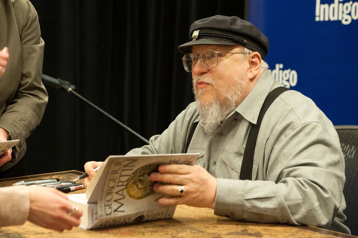 George R.R. Martin signs copies of his new book “A Dance With Dragons”