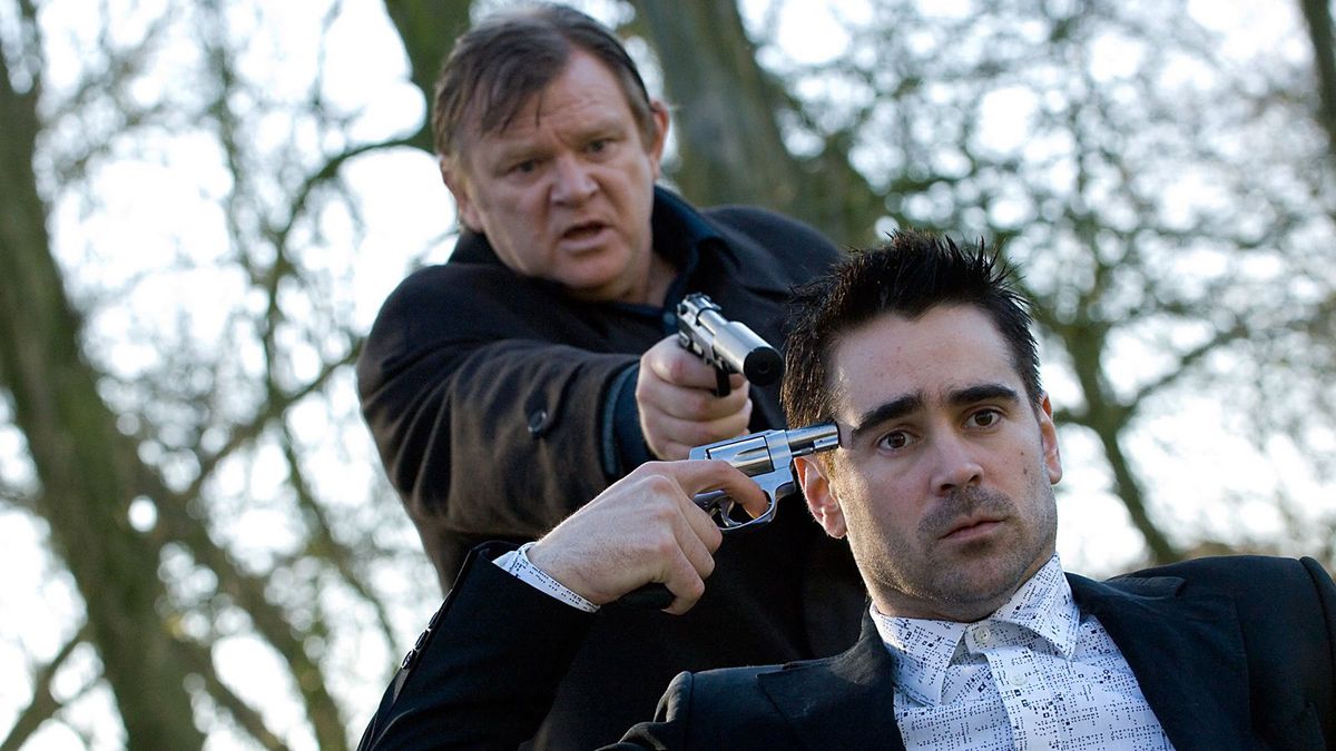 Brendan Gleeson holds a gun to Colin Farrell’s head, but surprise — Farrell is also holding a gun to his own head, in In Bruges